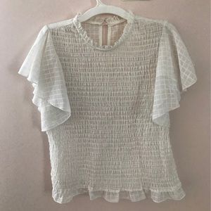 White flowy blouse